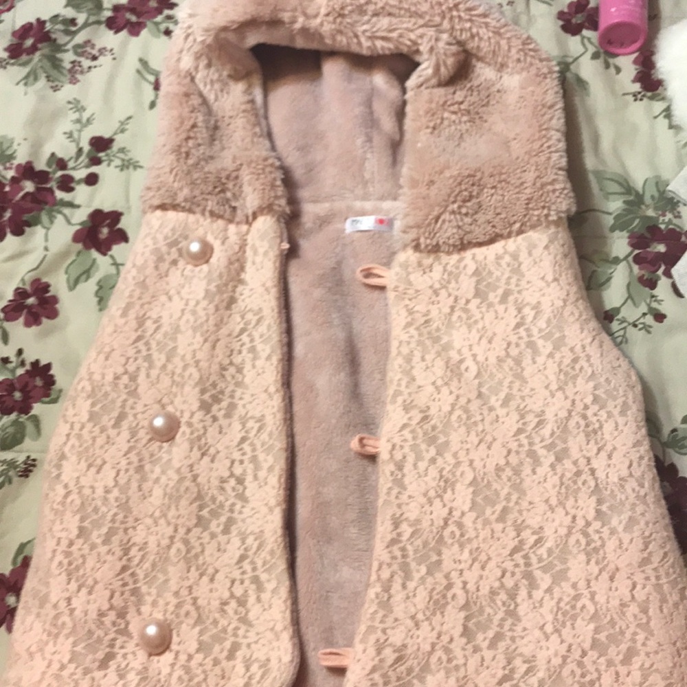 Fur jacket extra buttons too